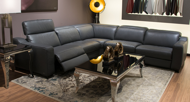 Leather sectional with recliner