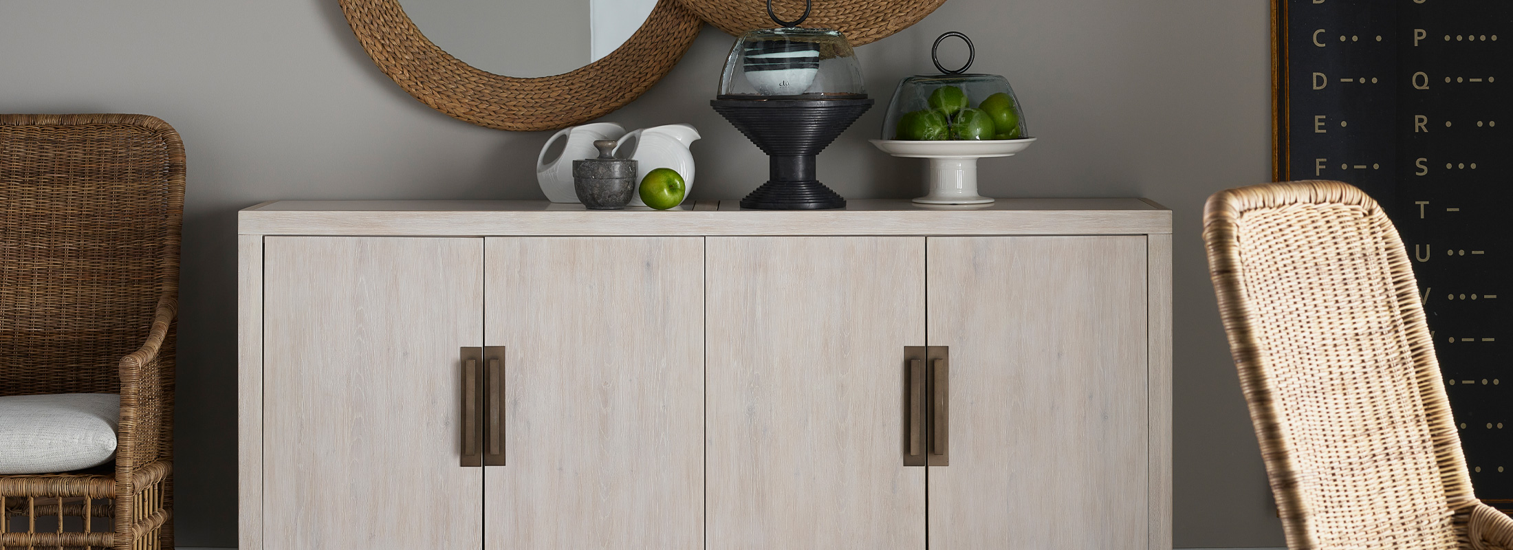 grey cupboards with tray of green apples