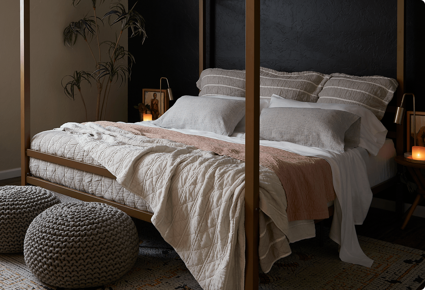 Bedroom scene featuring bed made with Dr. Weil bedding.