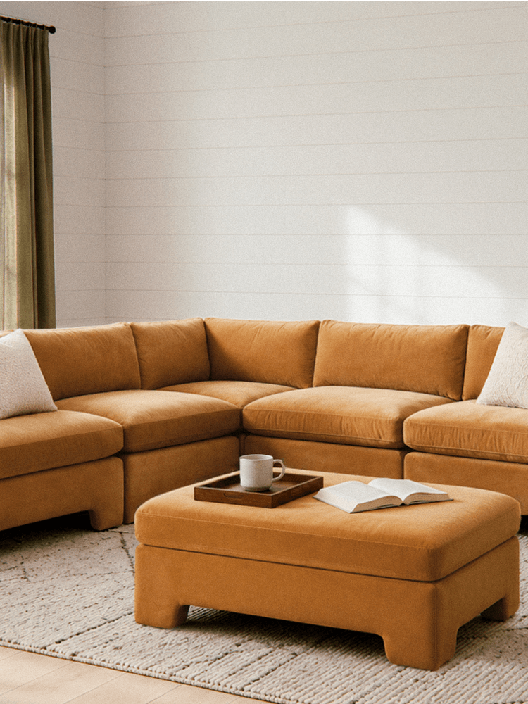Lazy Sunday Sectional and ottoman set in a brightly lit living room.