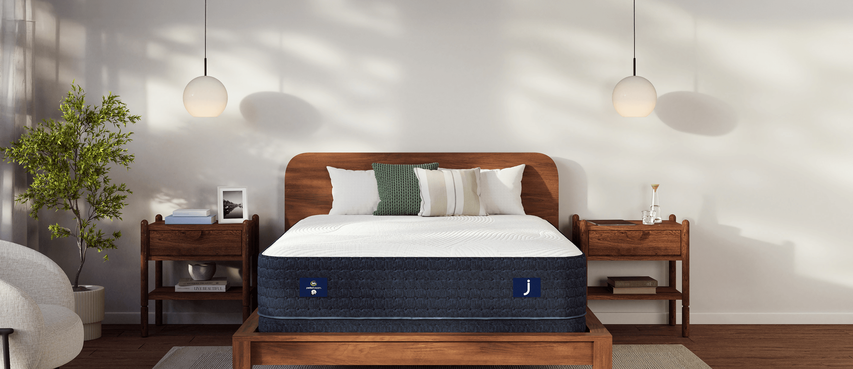 Serta Perfect Dream Queen Mattress set in a well-lit bedroom.