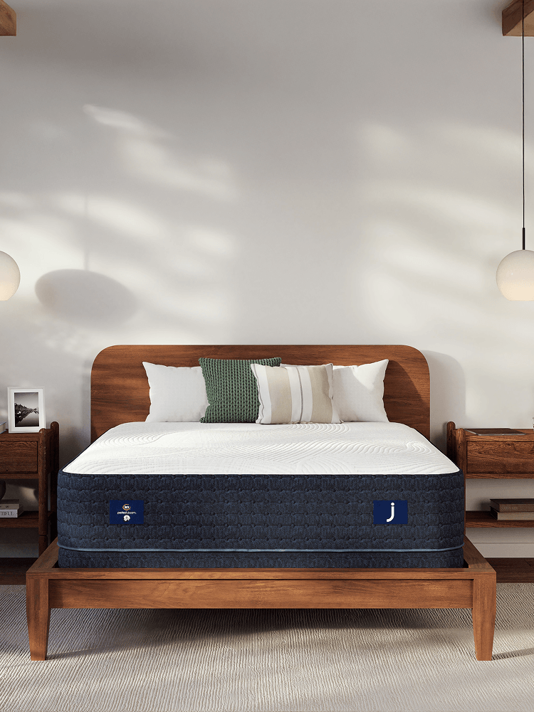 Serta Perfect Dream Queen Mattress set in a well-lit bedroom.