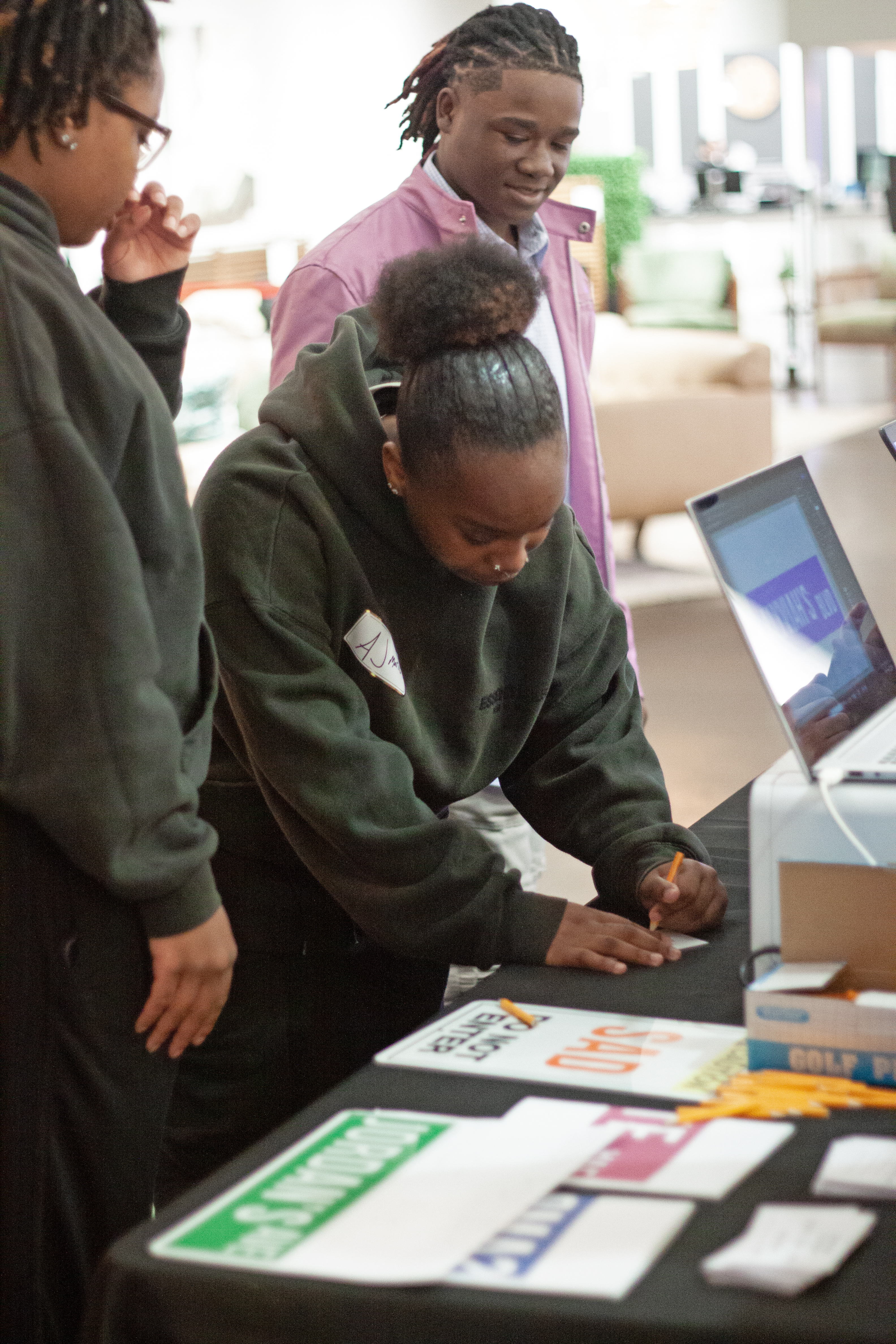 People completing forms