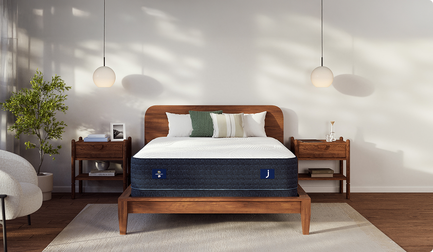 Bright, inviting bedroom showcasing mattress in center of room.